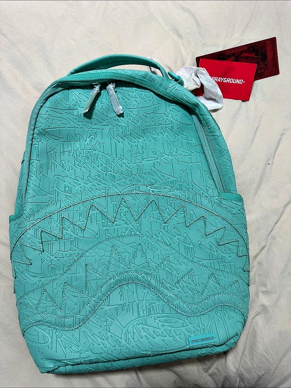 Sprayground Aqua Embossed Graffiti Backpack Turquoise